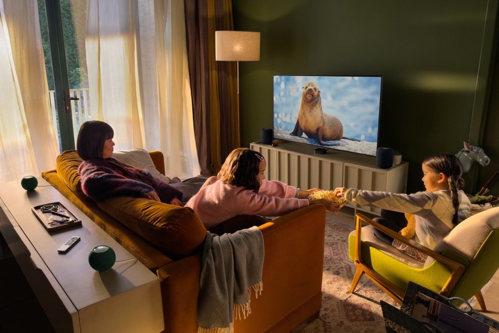 Apple TV 4K in a room with two HomePod speakers and two HomePod mini 2 speakers.