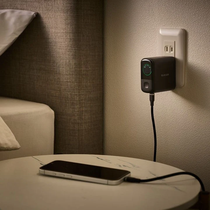 Elecom charger in wall outlet.