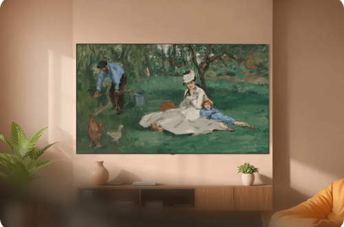 LG television displaying Édouard Manet’s The Monet Family in Their Garden at Argenteuil in a warm-toned room.