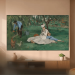 LG television displaying Édouard Manet’s The Monet Family in Their Garden at Argenteuil in a warm-toned room.