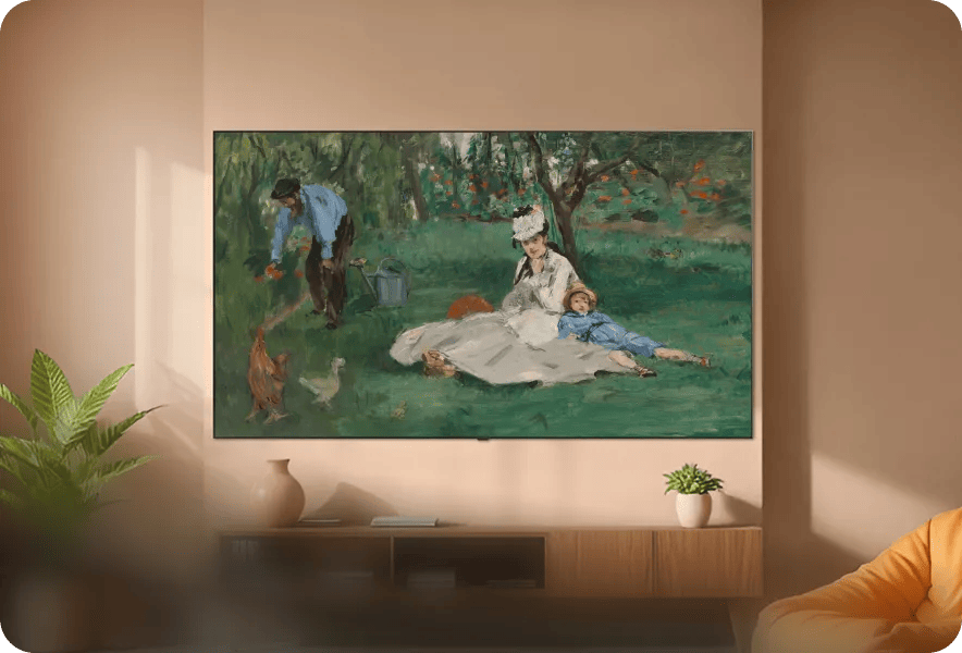 LG television displaying Édouard Manet’s The Monet Family in Their Garden at Argenteuil in a warm-toned room.
