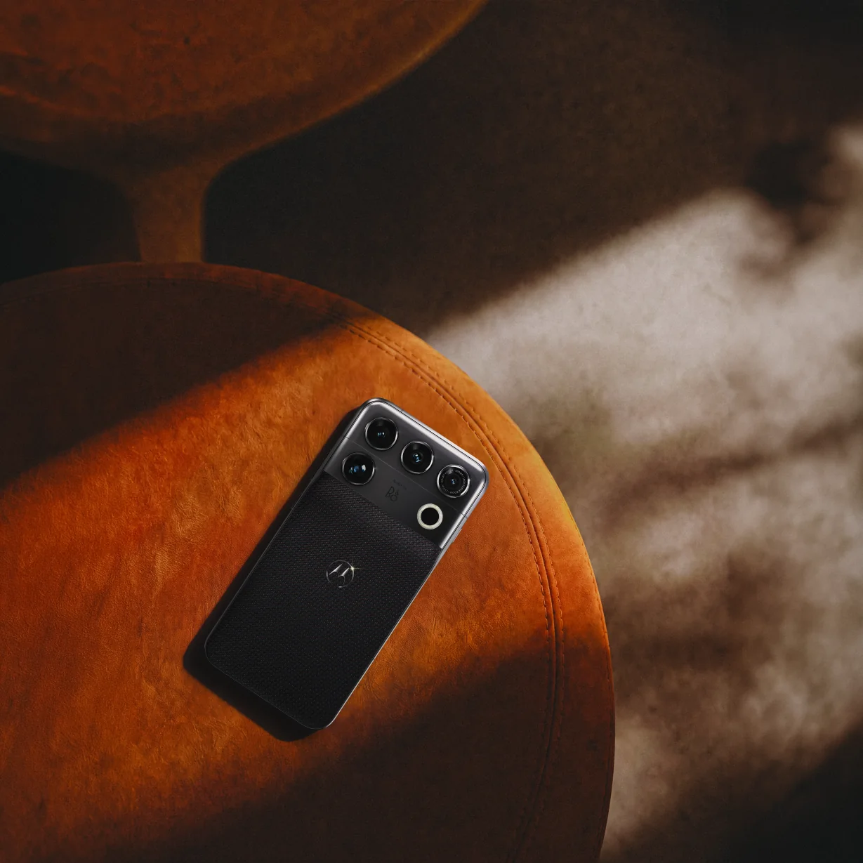 Signature 27 on an orange chair