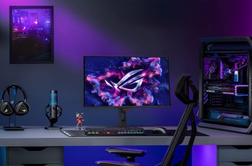 ASUS promotional desk setup with a ROG Strix OLED gaming monitor
