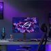 ASUS promotional desk setup with a ROG Strix OLED gaming monitor